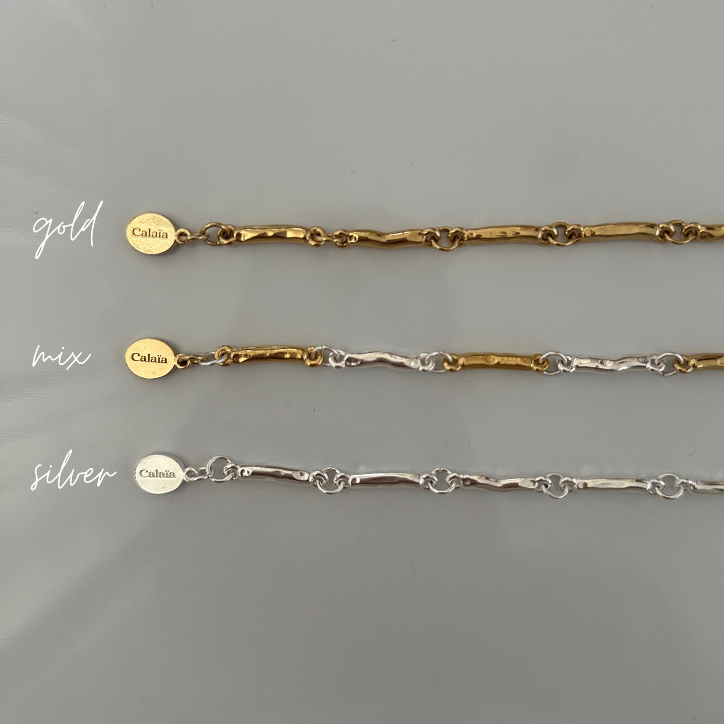 CADENA BONES ORO/PLATA
